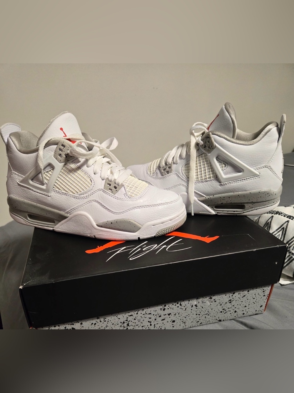 Air Jordan Retro 4’s Youth White and Oreo High-Top Sneakers with Red Jumpman